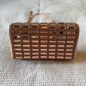 Rose gold rhinestone bag.  6” width, 4” tall.